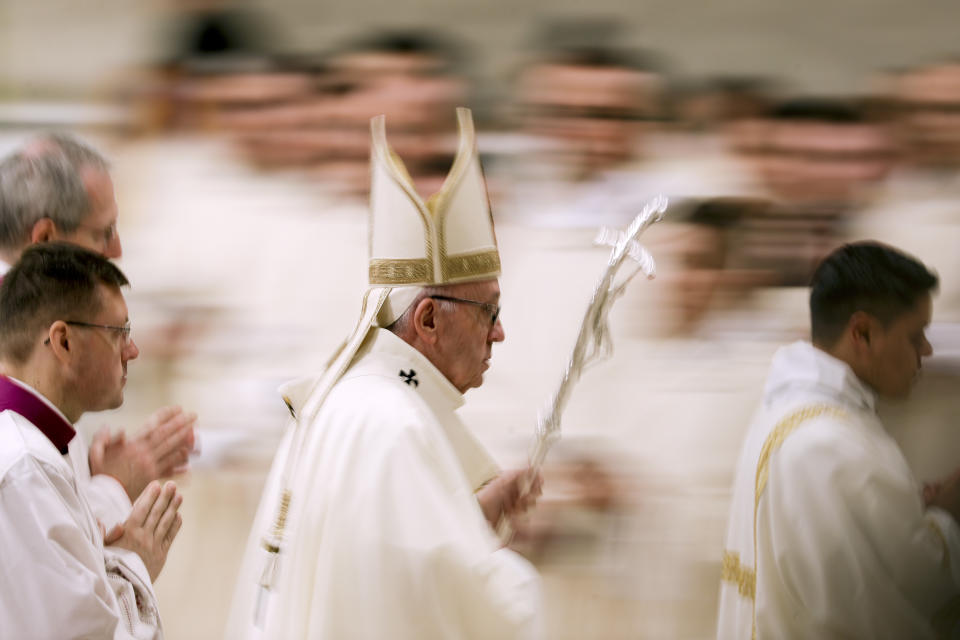 Pope Francis leaves after he celebrated Mass on the occasion of the feast of Our Lady of Guadalupe, in St. Peter's Basilica at the Vatican, Wednesday, Dec. 12, 2018. (AP Photo/Andrew Medichini)
