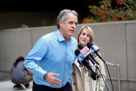 James Otis, the man who admits vandalizing Donald Trump's star on the Hollywood Walk of Fame, speaks to the media with his attorney Mieke ter Poorten about his arrest outside of the LAPD Metropolitan Detention Center in Los Angeles, California October 27, 2016. REUTERS/Patrick T. Fallon