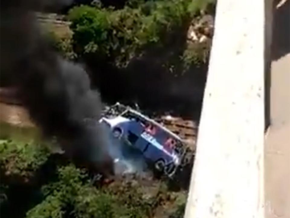 Footage from the incident showed the bus in flames after crashing over the bridge@KeriatiDiaz/Twitter