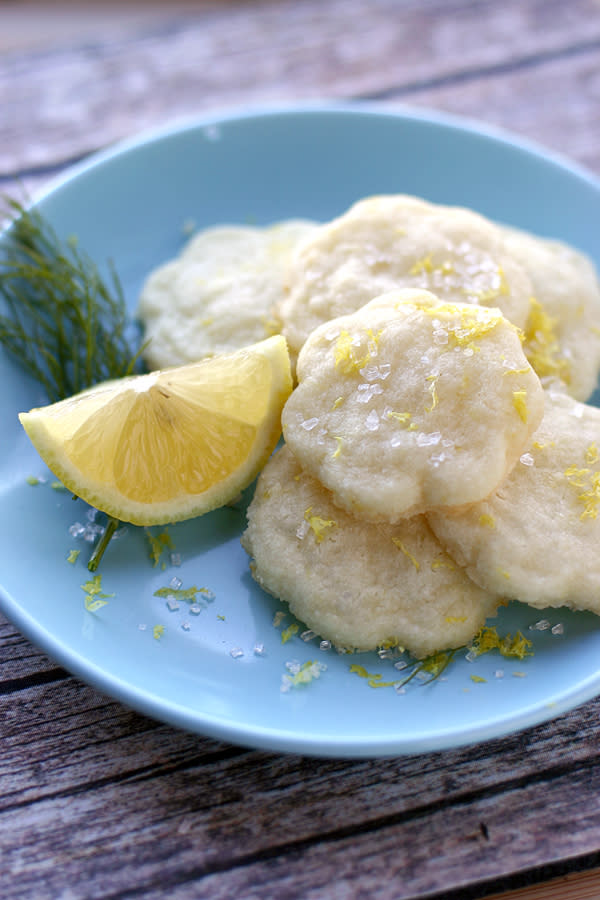 <div class="caption-credit"> Photo by: Brooke McClay</div><b>Lemon Shortbread</b> <br> These zesty nibbles have a hit of citrus -- perfect for the cold winter season. This recipe would be delicious with orange, too! <br> <a href="http://www.babble.com/best-recipes/10-things-to-do-with-shortbread/#lemon-shortbread" rel="nofollow noopener" target="_blank" data-ylk="slk:Get the recipe;elm:context_link;itc:0;sec:content-canvas" class="link "><i>Get the recipe</i></a> <br>