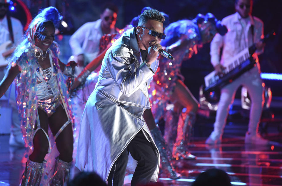 FILE - Ozuna performs at the Latin American Music Awards in Los Angeles on Oct. 17, 2019. Ozuna received eight nominations at the 2020 Latin Grammys, which will air live on Nov. 19 on Univision. (Photo by Chris Pizzello/Invision/AP, File)