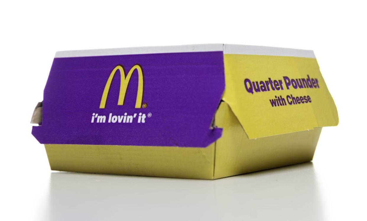 Miami, USA - March 21, 2015: Quarter pounder with cheese box. McDonalds brand is owned by MCDONALD'S CORPORATION.