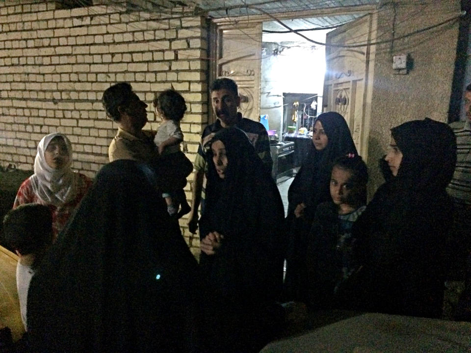 <p>People stand in the street after feeling aftershocks from an earthquake in Baghdad, Iraq, Nov. 12, 2017. The deadly earthquake hit the region along the border between Iran and Iraq on Sunday. (Photo: Hadi Mizban/AP) </p>