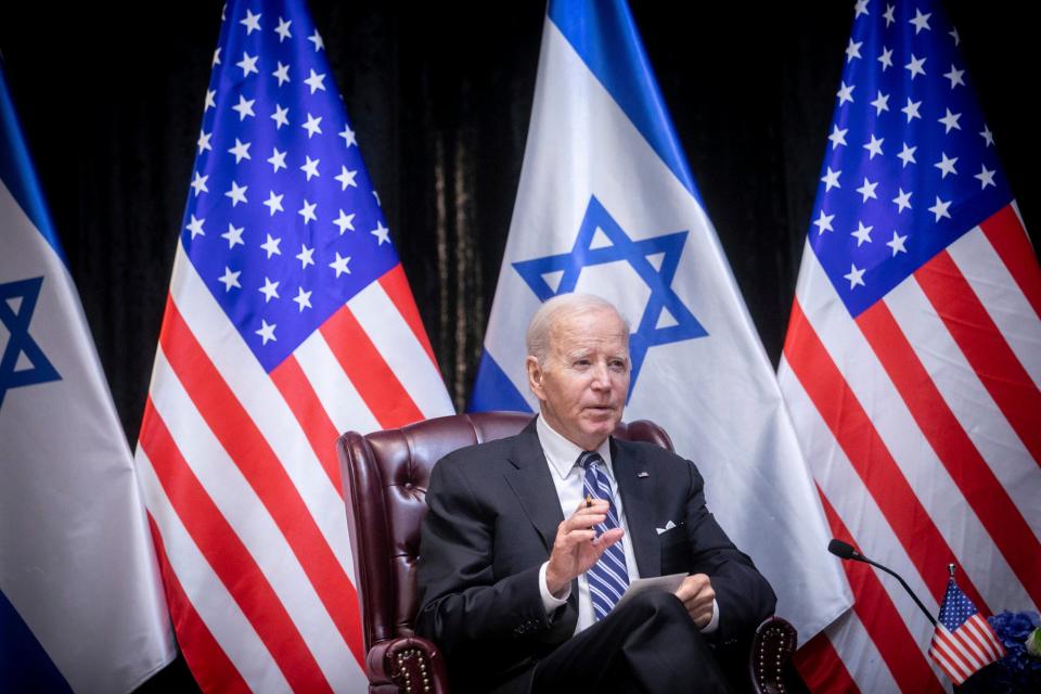 U.S. President Joe Biden speaks during a meeting with Israeli Prime Minister Benjamin Netanyahu to discuss the war between Israel and Hamas, in Tel Aviv, Israel, Wednesday, Oct. 18, 2023. (Miriam Alster/Pool Photo via AP)