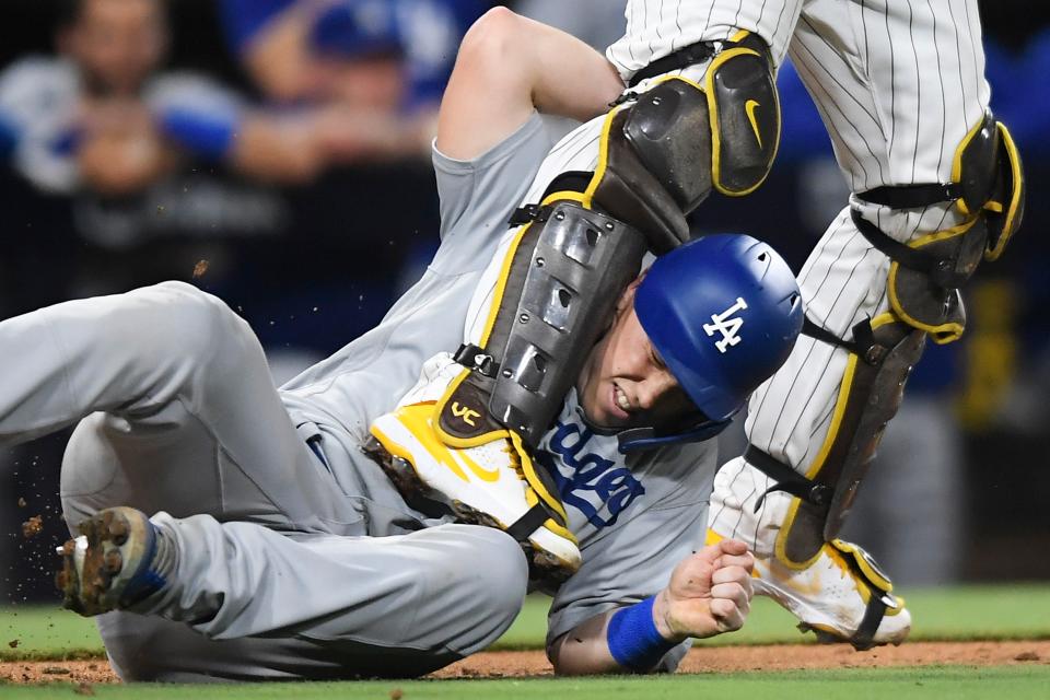 Will Smith gets tangled up with Victor Caratini in the 13th inning.