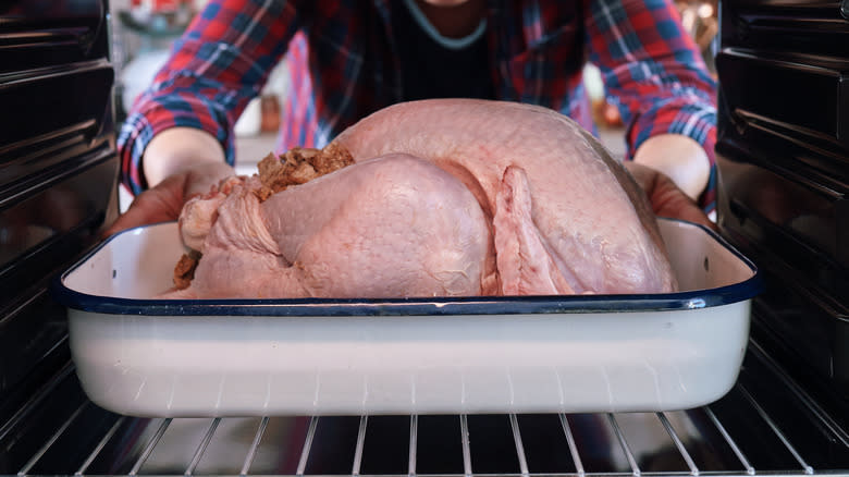 raw turkey in oven
