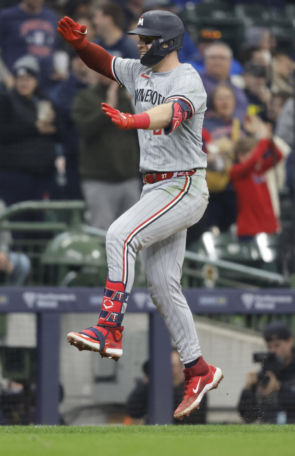 Minnesota Twins' Ryan Jeffers reacts after he hit a three-run home run during the seventh inning of a baseball game against the Milwaukee Brewers Wednesday, April 3, 2024, in Milwaukee. (AP Photo/Jeffrey Phelps)