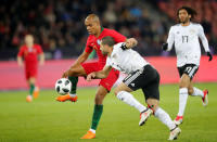 Soccer Football - International Friendly - Portugal vs Egypt - Letzigrund, Zurich, Switzerland - March 23, 2018 Portugal's Joao Mario in action with Egypt’s Ahmed Fathi REUTERS/Arnd Wiegmann