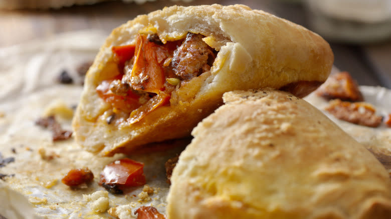 tomato, sausage, cheese calzone