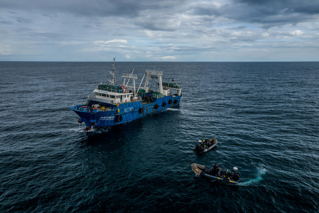 Sea Shepherd speedboats next to a Chinese fishing vessel in Gambian waters. (Fábio Nascimento / The Outlaw Ocean Project)