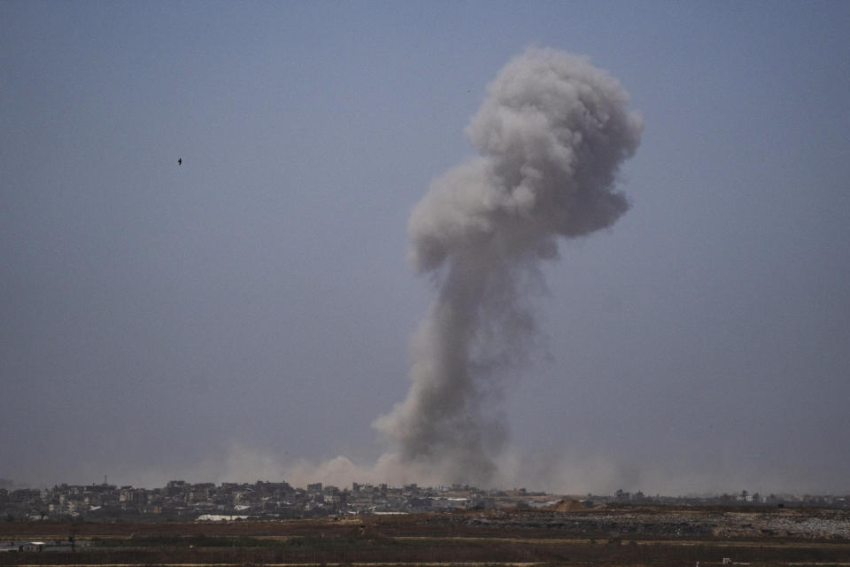 Smoke billows after an explosion in the Gaza Strip, as seen from southern Israel Tuesday, May 21, 2024. (AP Photo/Leo Correa)