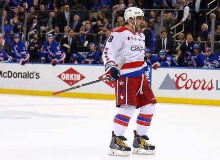 Apr 30, 2015; New York, NY, USA; Washington Capitals left wing Alex Ovechkin (8) celebrates a goal scored by Joel Ward (42) (not pictured) against the New York Rangers during the third period in game one of the second round of the 2015 Stanley Cup Playoffs at Madison Square Garden. The Capitals defeated the Rangers 2 - 1. Mandatory Credit: Adam Hunger-USA TODAY Sports