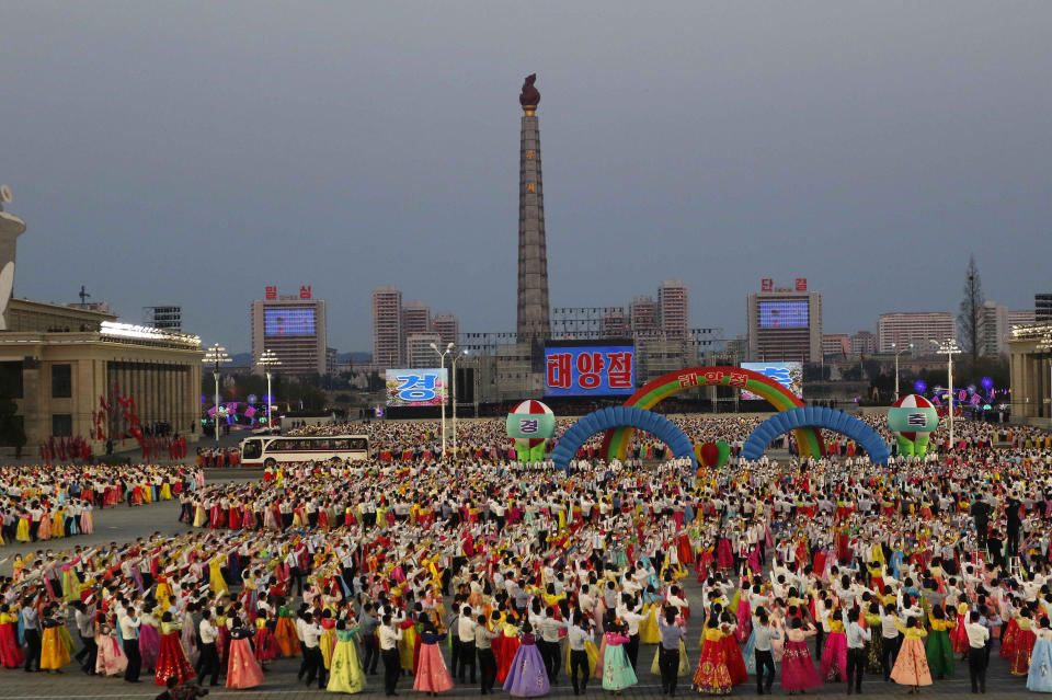 Students and youth attend a dancing party in celebration of the 110th birth anniversary of its late founder Kim Il Sung at Kim Il Sung Square in Pyongyang, North Korea Friday, April 15, 2022. (AP Photo/Jon Chol Jin)