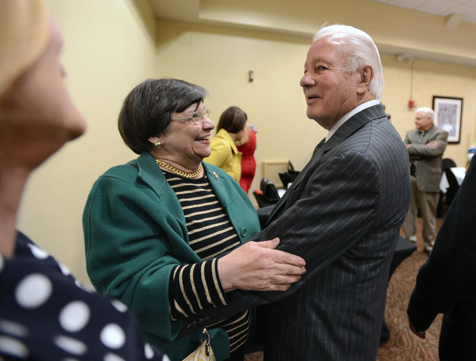 Former Louisiana Gov. Edwin Edwards, right, hugs a friend, Mary Jane Marcantel, left, after he spoke at the Baton Rouge Press Club, Monday, March 17, 2014, in Baton Rouge, La. Edwards announced that he would join the race to represent the state’s Baton Rouge-based 6th District of the U.S. House of Representatives. (AP Photo/Travis Spradling)