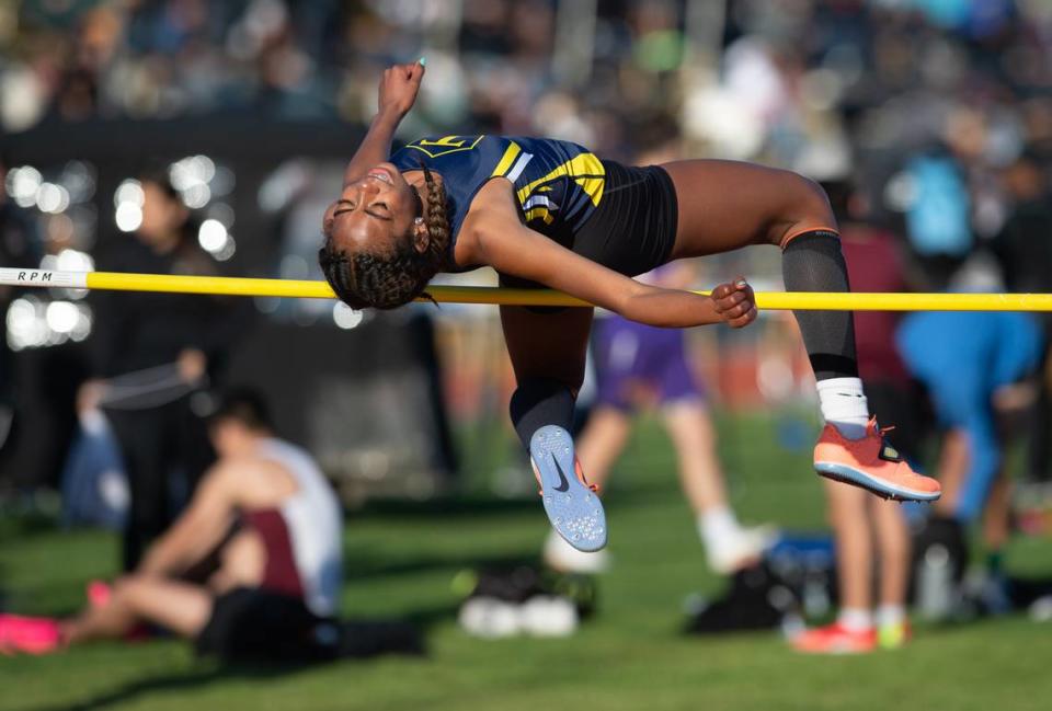 Turlock’s Olivia Walker placed second with a high jump of 4’10 during the Stanislaus County track meet at Hughson High School in Hughson, Calif., Friday, March 24, 2023.