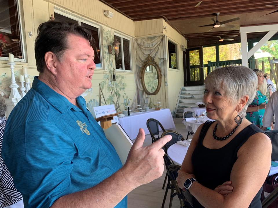 John Horne, chairman of the Board of the Florida Restaurant and Lodging Association, talks with Sara Malmstrom, owner of Sage Bistro in Cape Canaveral and chair of the local chapter of the organization. The two chatted after a FRLA meeting at Yellow Dog Cafe in Malabar.