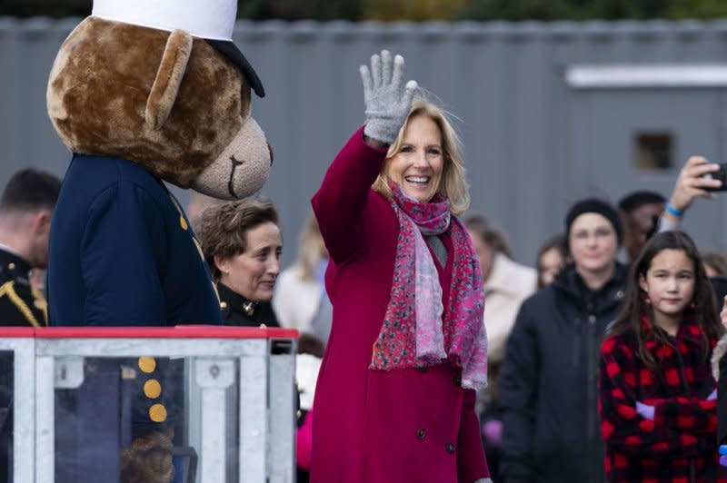 First lady Jill Biden waves after greeting children of local Marine Corps and military-connected families as they leave the White House Ice Rink ahead of a Toys for Tots event Wednesday. Photo by Bonnie Cash/UPI
