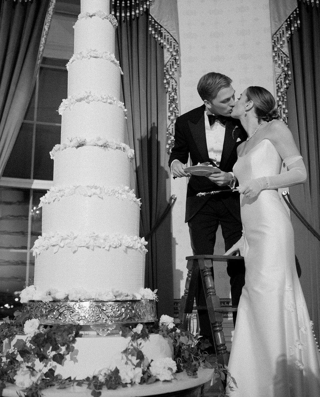 Naomi Biden and Husband Peter Neal Climbed a Ladder to Slice Their Eight-Tier Wedding Cake