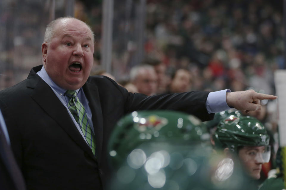 Minnesota Wild's head coach Bruce Boudreau shouts after a penalty call in the second period of an NHL hockey game against the Vancouver Canucks, Sunday, Jan. 12, 2020, in St. Paul, Minn. (AP Photo/Stacy Bengs)