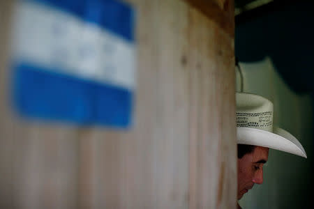 Jose Guardado, 42, a deportee from the U.S. and separated from his son Nixon Guardado, 12, at the McAllen entry point as a result of the Trump administration's hardline immigration policy, stands inside his home in Eden, Lepaera, Honduras June 23, 2018. REUTERS/Carlos Jasso