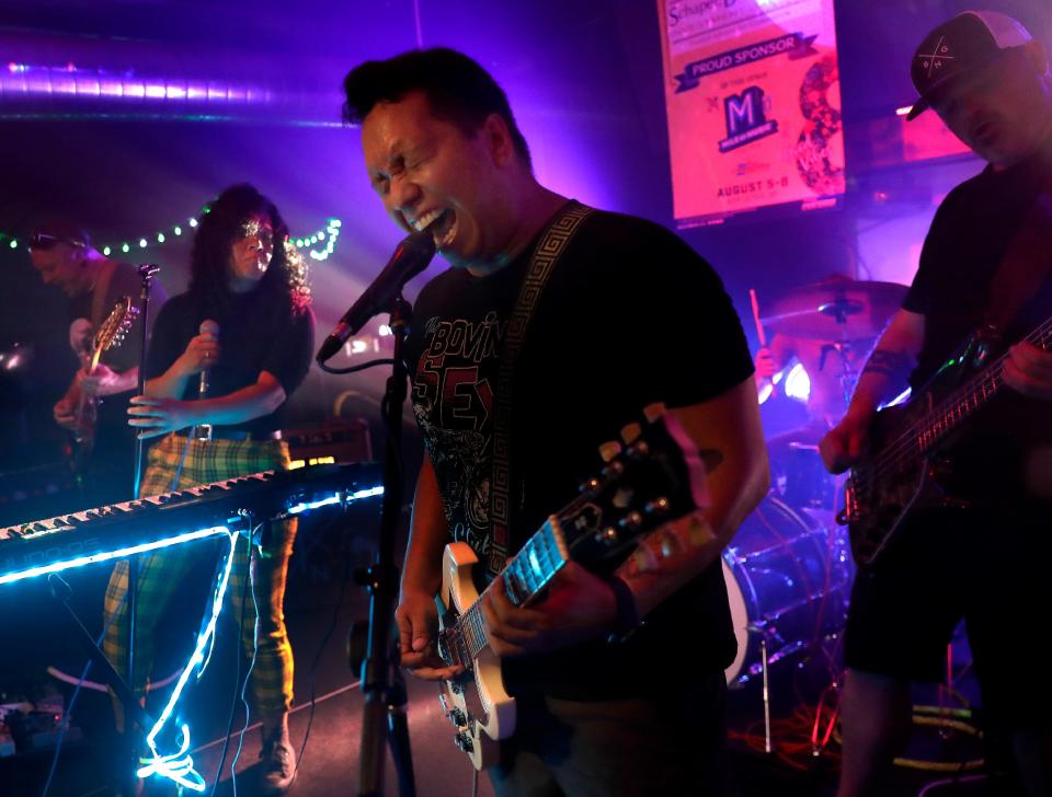 Black Note Graffiti performs at Chadwick's Bar during the annual Mile of Music festival on Friday, Aug. 6, 2021, in Appleton.