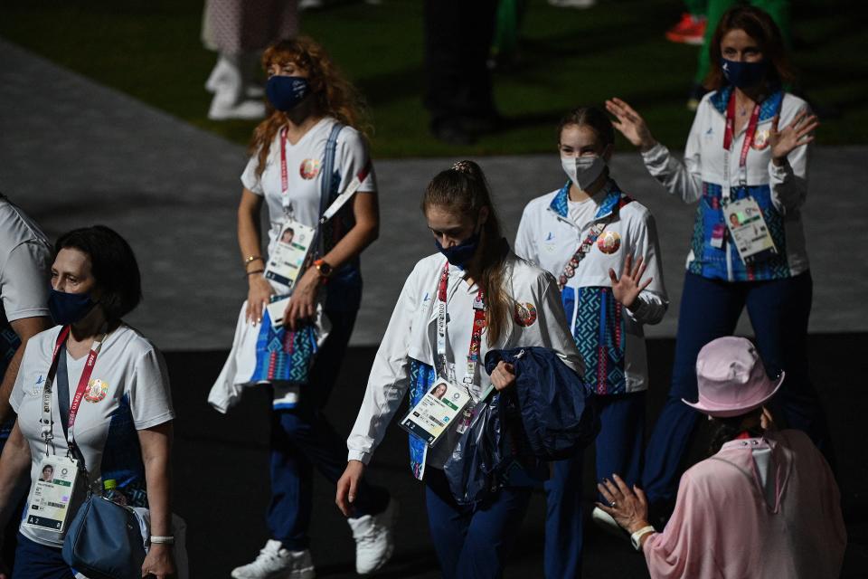 Athletes from Belarus' delegation leave the field of play early during the closing ceremony of the Tokyo 2020 Olympic Games, on August 8, 2021 at the Olympic Stadium in Tokyo. (Photo by Oli SCARFF / AFP) (Photo by OLI SCARFF/AFP via Getty Images)