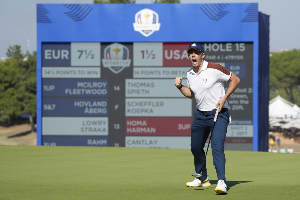 Europe's Rory Mcilroy celebrates after putting on the 15th green during their morning Foursomes match at the Ryder Cup golf tournament at the Marco Simone Golf Club in Guidonia Montecelio, Italy, Saturday, Sept. 30, 2023. (AP Photo/Alessandra Tarantino)