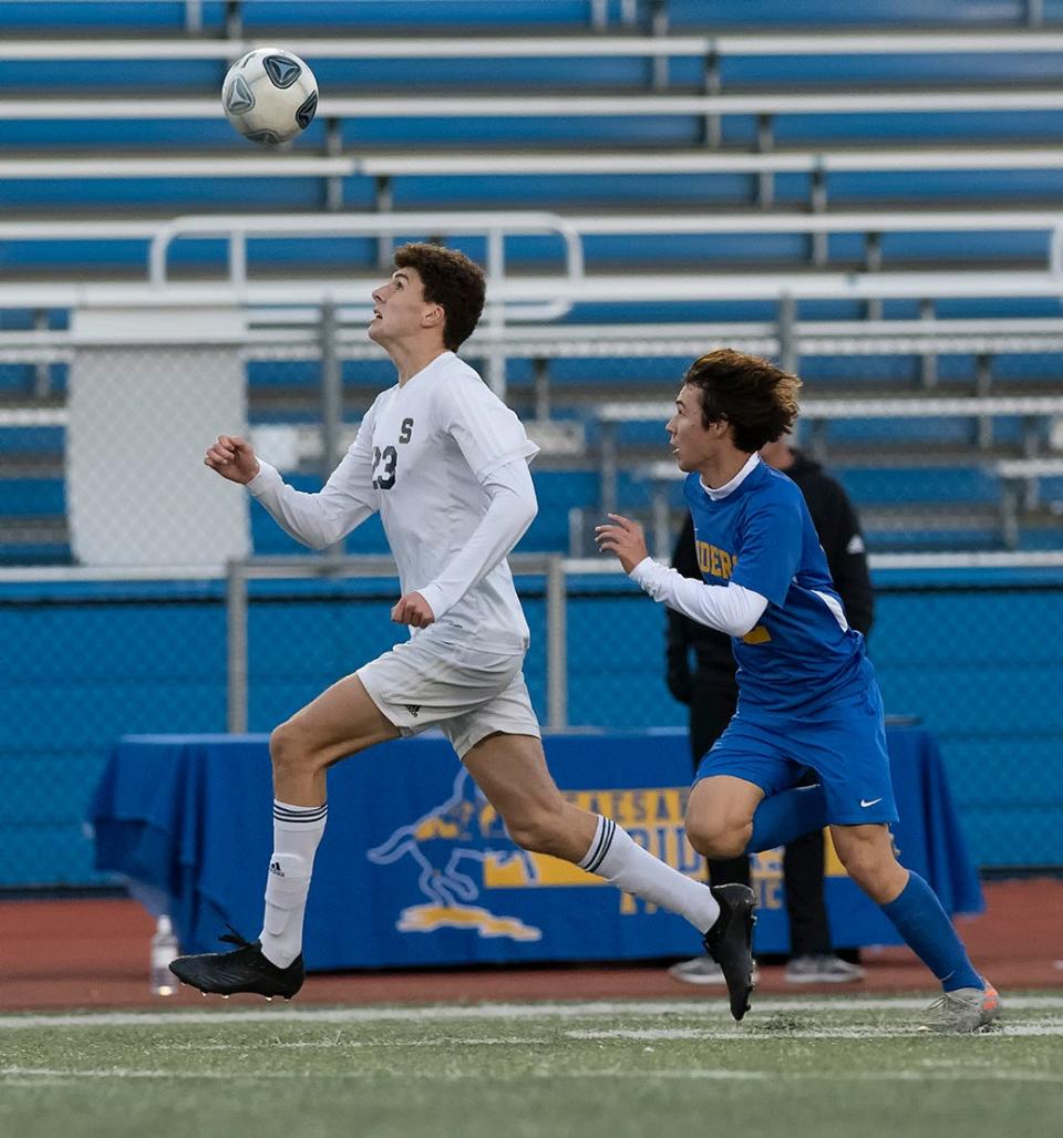 Salesianum's Jake Ross (23) runs after the ball in the DIAA Boys Soccer Division I championship game at Dover High School.