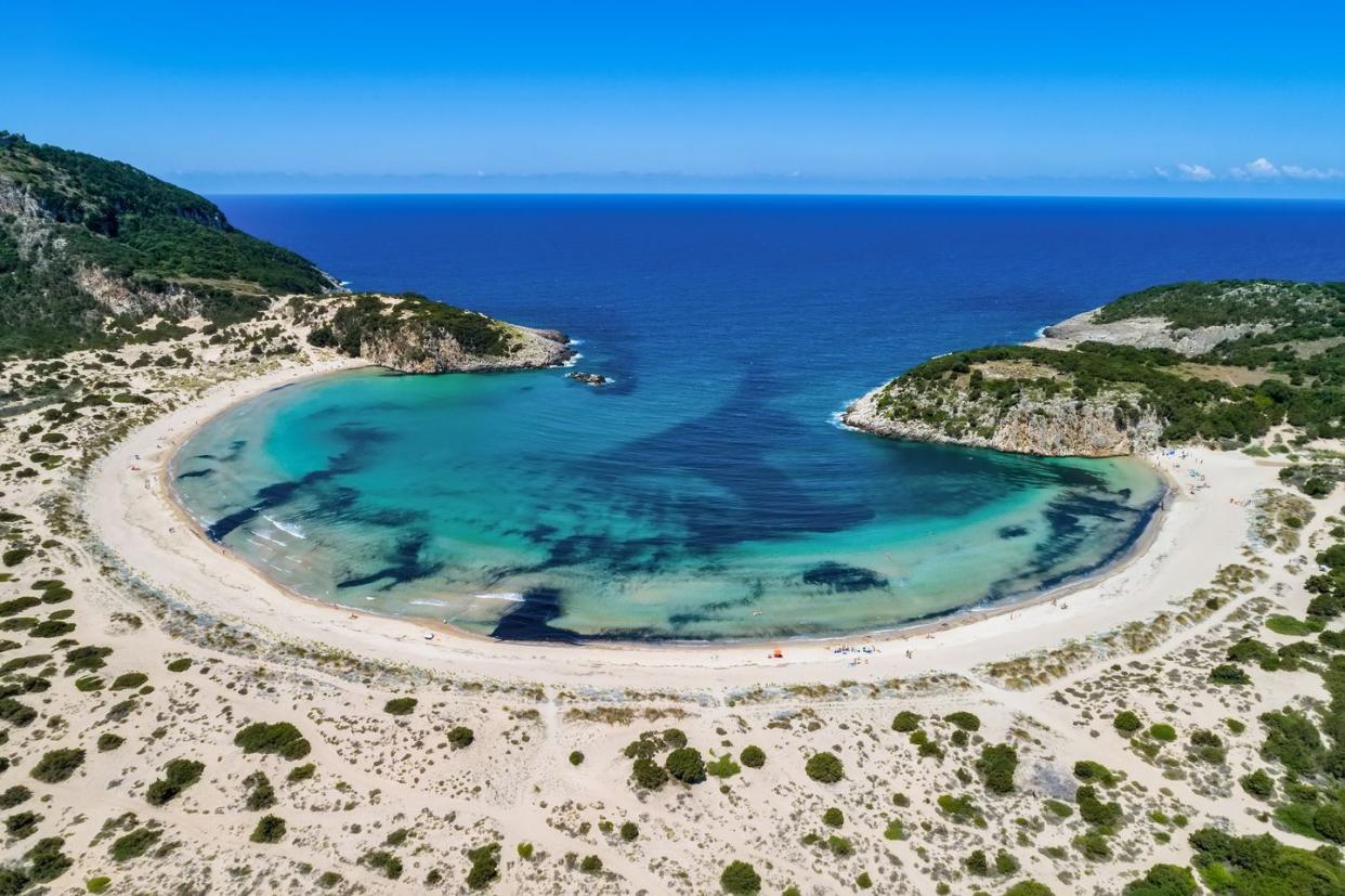 panoramic aerial view of voidokilia beach, one of the best beaches in mediterranean europe, beautiful lagoon of voidokilia from a high point of view, messinia, greece