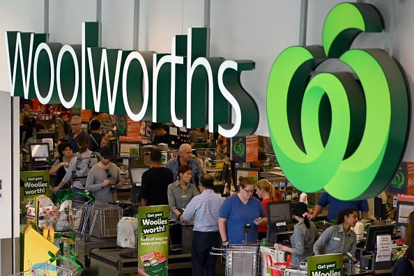 People shop at a Woolworths supermarket in Sydney. 