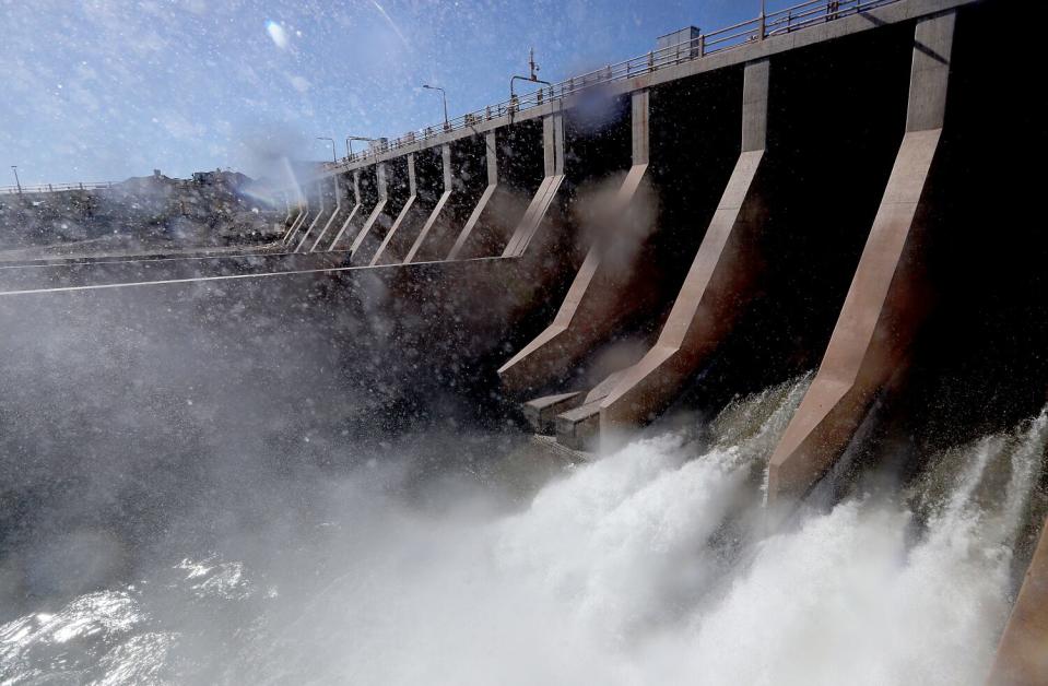 Colorado River water churns through the Imperial Dam near Yuma.