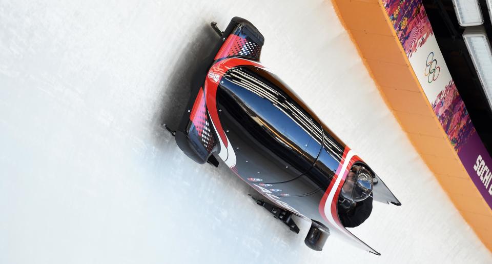 Austria-1, two-woman bobsleigh steered by Christina Hengster takes a practice run during a training session at the Sanki Sliding Center in Rosa Khutor during the Sochi Winter Olympics on February 15, 2014.