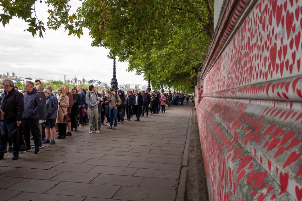 Members of the public continue to wait in line to pay their respects to Queen Elizabeth II as she lays in state within Westminster Hall on September 16, 2022 in London, England.