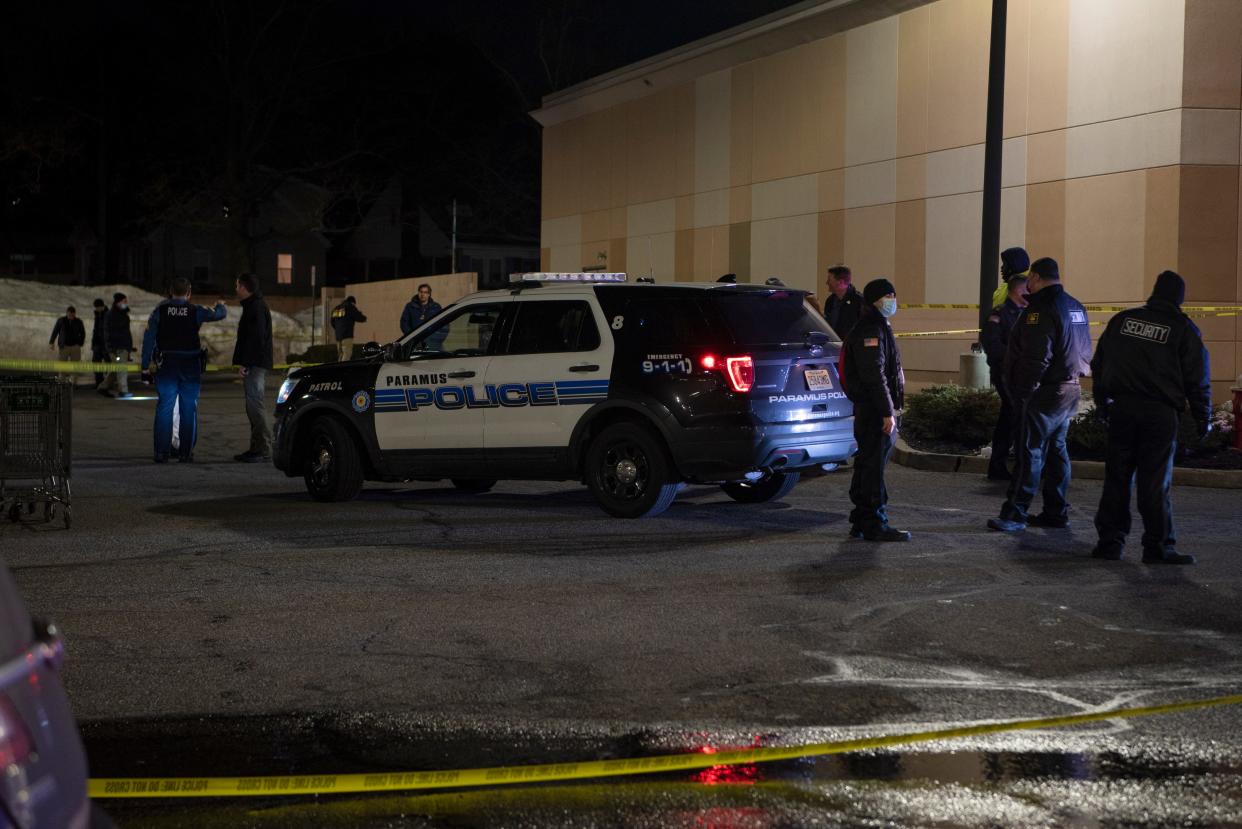 Members of the Paramus police department and Bergen County Sheriff Office investigate a stabbing at Bergen Town Center in Paramus on Tuesday evening, February 16, 2021.  