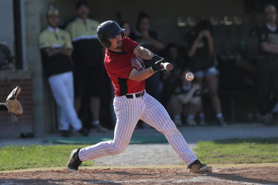 Wapahani senior Paul Fisher makes contact in his team's 3-0 victory over Daleville in the first round of the Delaware County baseball tournament at Yorktown High School on Tuesday, May 9, 2023.