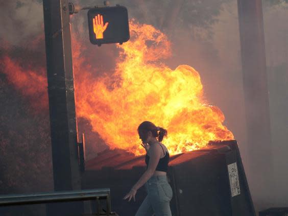 Protesters set fire to bins in St. Paul (Getty Images)