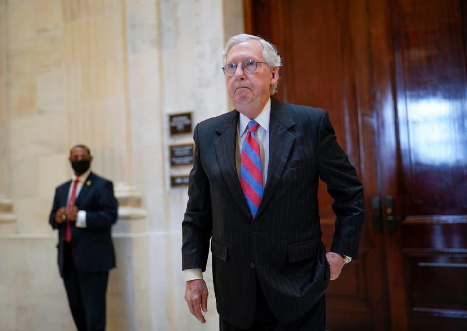 Senate Minority Leader Mitch McConnell, R-Ky., returns to the Senate chamber for a vote after attending a bipartisan barbecue luncheon, at the Capitol in Washington, Thursday, Sept. 23, 2021. (AP Photo/J. Scott Applewhite)