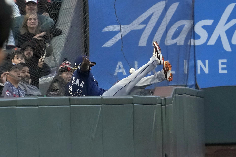 Tampa Bay Rays left fielder Randy Arozarena cannot catch fly ball in foul territory hit by San Francisco Giants' Michael Conforto during the fifth inning of a baseball game in San Francisco, Tuesday, Aug. 15, 2023. (AP Photo/Jeff Chiu)