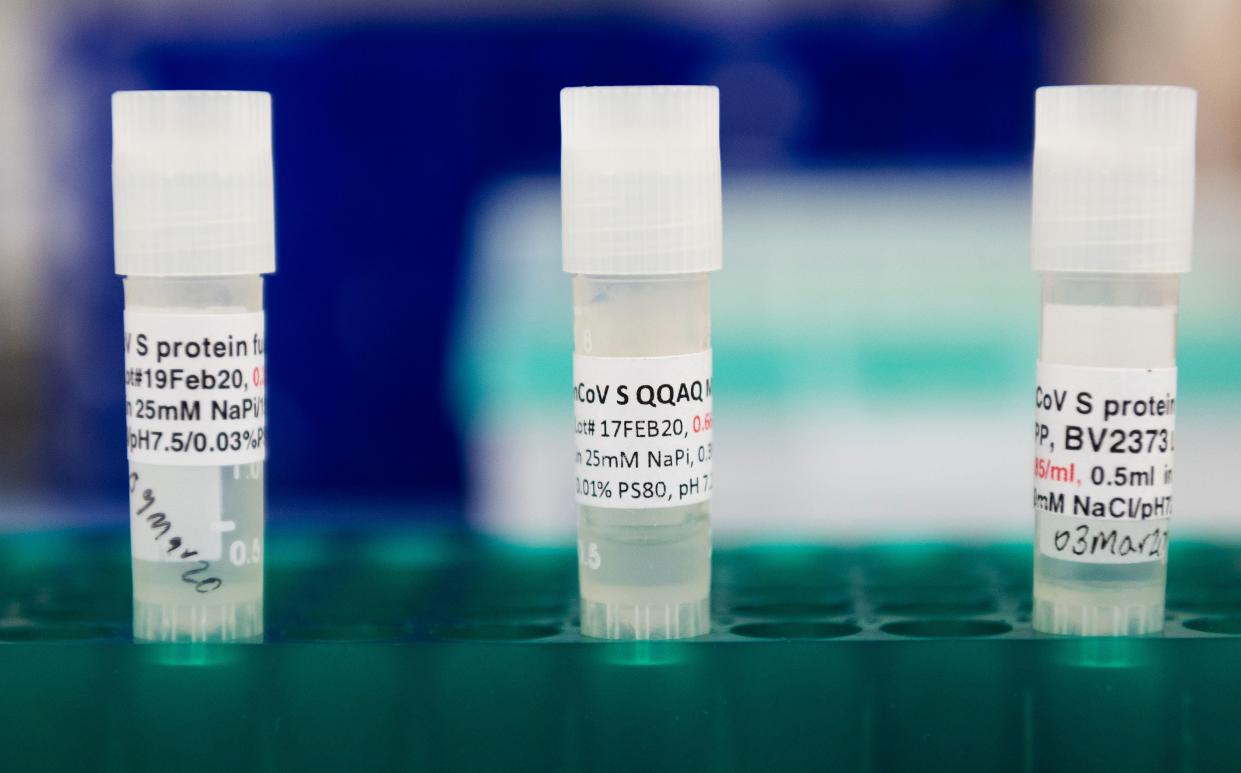 Three potential coronavirus COVID-19 vaccines are kept in a tray at Novavax labs in Rockville, Maryland. President Trump has suggested a vaccine will be available by the end of the year but experts disagree. (Photo by ANDREW CABALLERO-REYNOLDS/AFP via Getty Images)