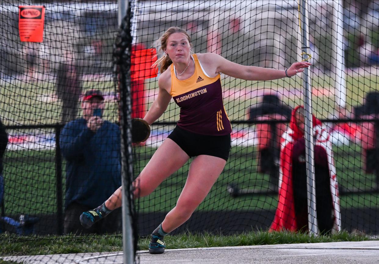Bloomington North’s Hadley Lucas competes in the discus during the track meet at Owen Valley on Thursday, March 28, 2024.