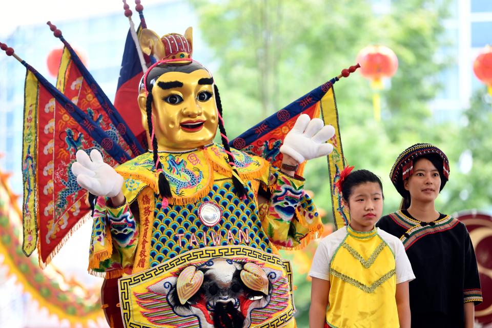 A Taiwan Electric-Techno Neon God costume at the Knox Asian Festival on Sunday, August 25, 2019 at World's Fair Park.