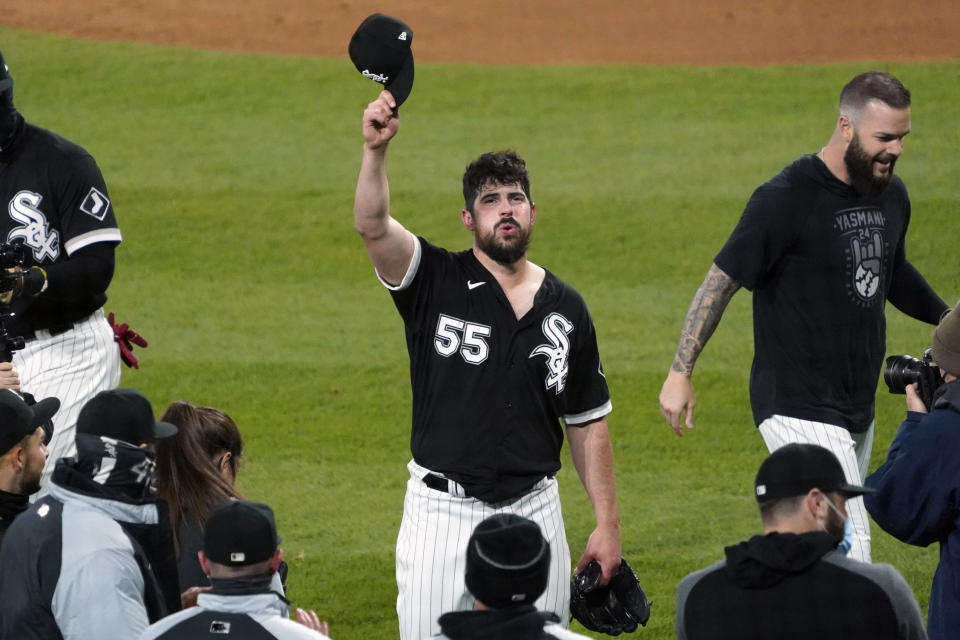 Chicago White Sox starting pitcher Carlos Rodon (55) celebrates his no hitter against the Cleveland Indians with his teammates in a baseball game, Wednesday, April, 14, 2021, in Chicago. (AP Photo/David Banks)