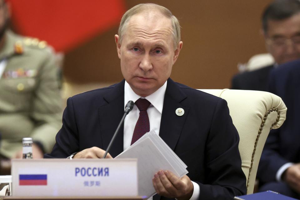 Russian President Vladimir Putin speaks at the Shanghai Cooperation Organization (SCO) summit in Samarkand, Uzbekistan, Friday, Sept. 16, 2022. (Sergei Bobylev, Sputnik, Kremlin Pool Photo via AP)