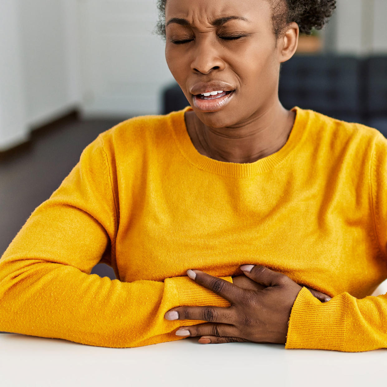 woman experiencing bloating