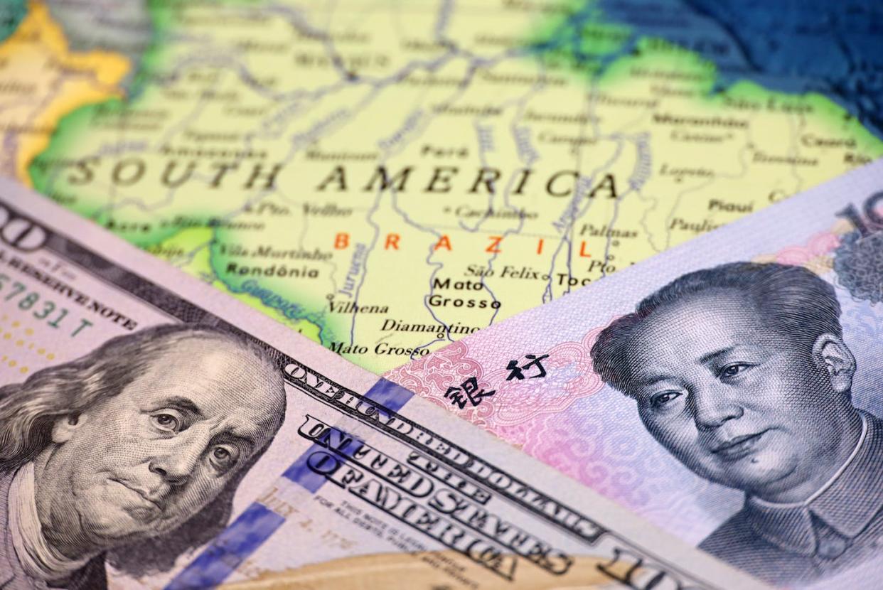 <a href="https://www.shutterstock.com/es/image-photo/us-dollar-chinese-yuan-on-map-2138487509" rel="nofollow noopener" target="_blank" data-ylk="slk:Shutterstock / Oleg Elkov;elm:context_link;itc:0;sec:content-canvas" class="link ">Shutterstock / Oleg Elkov</a>