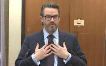 In this image from video, defense attorney Eric Nelson speaks as Hennepin County Judge Peter Cahill discusses motions before the court Thursday, April 15, 2021, in the trial of former Minneapolis police officer Derek Chauvin at the Hennepin County Courthouse in Minneapolis. Chauvin is charged in the May 25, 2020 death of George Floyd. (Court TV via AP, Pool)