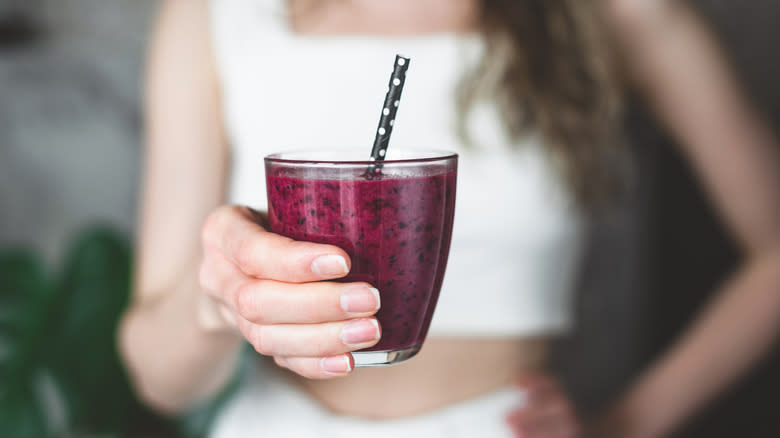 Açaí smoothie in hands