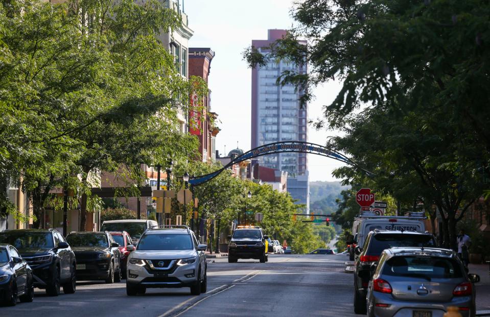 Traffic moves along Market Street in downtown Wilmington, Tuesday, Sept. 19, 2023.