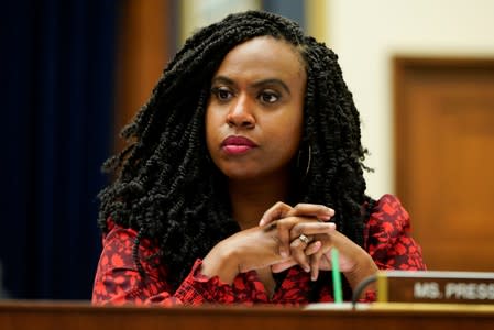 Rep. Ayanna Pressley (D-MA) listens as David Marcus, CEO of Facebook’s Calibra, testifies to the House Financial Services Committee in Washington.