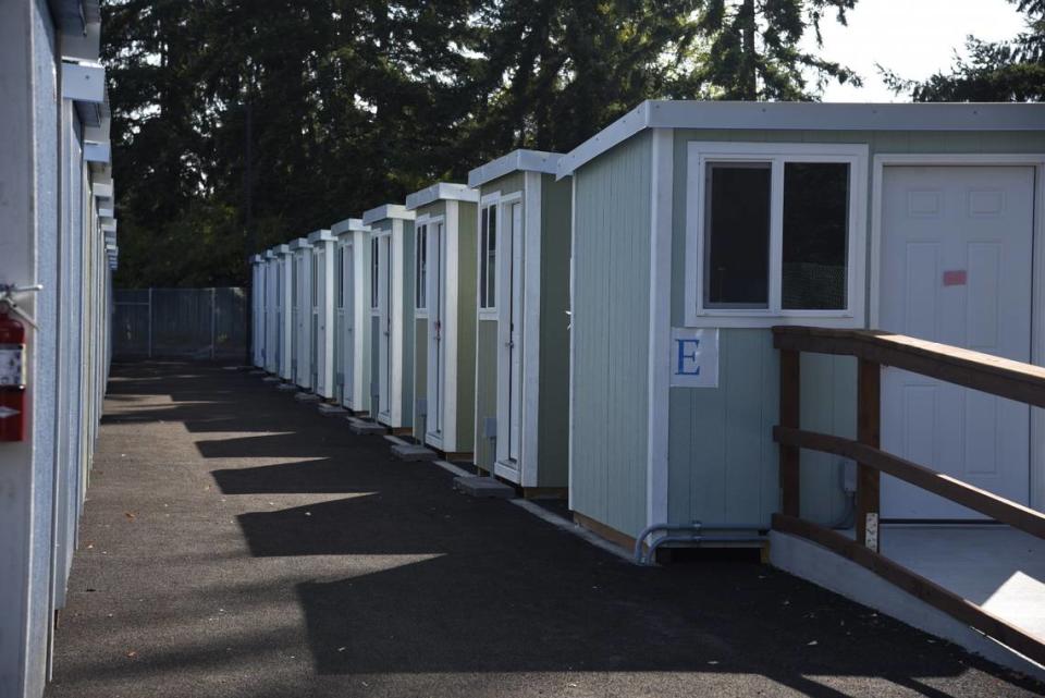 A row of tiny homes in the newly-opened tiny home village off of Franz Anderson Road in Olympia on Sept. 8, 2023. Residents began moving in this week from Wheeler Road as part of an initiative to move people out of right of ways in Washington state.